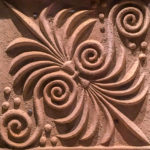 Etruscan palmette and spiral architectural plaque (reproduction) from a 3rd century BCE sanctuary excavated in Camucia. Museum of Etruscan Academy (MAEC) - Cortona, Italy.