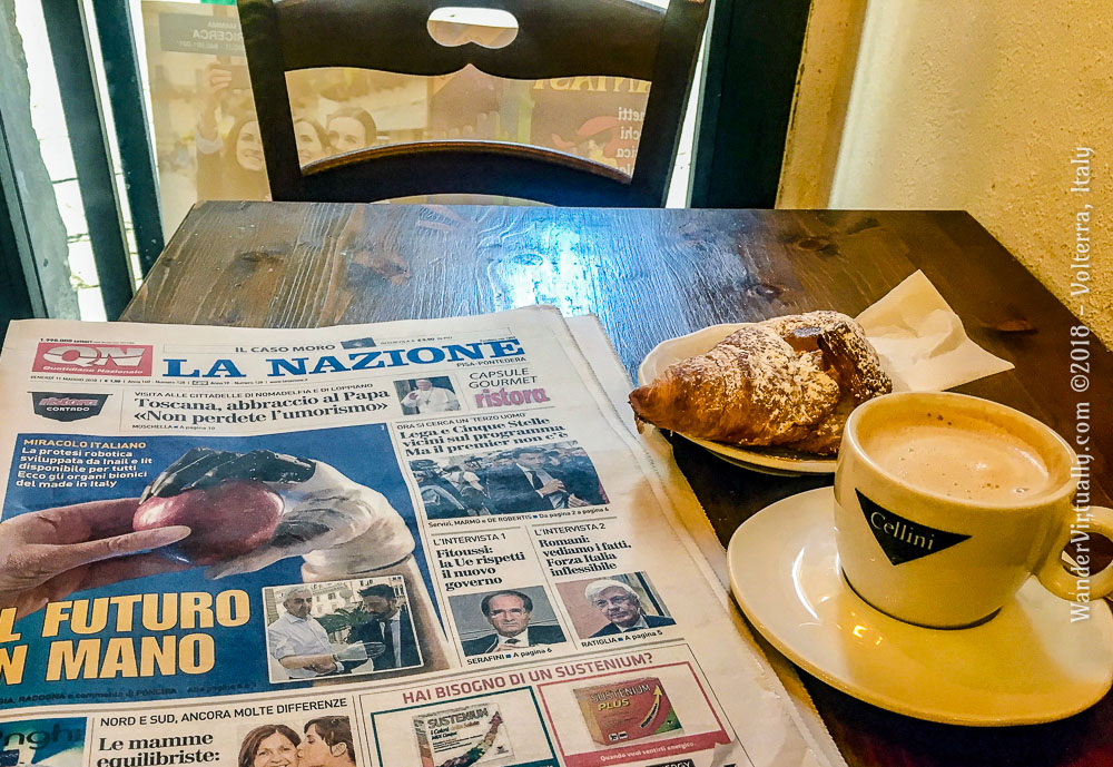 A typical breakfast in Italy: Cappuccino and a chocolate-filled cornetto.