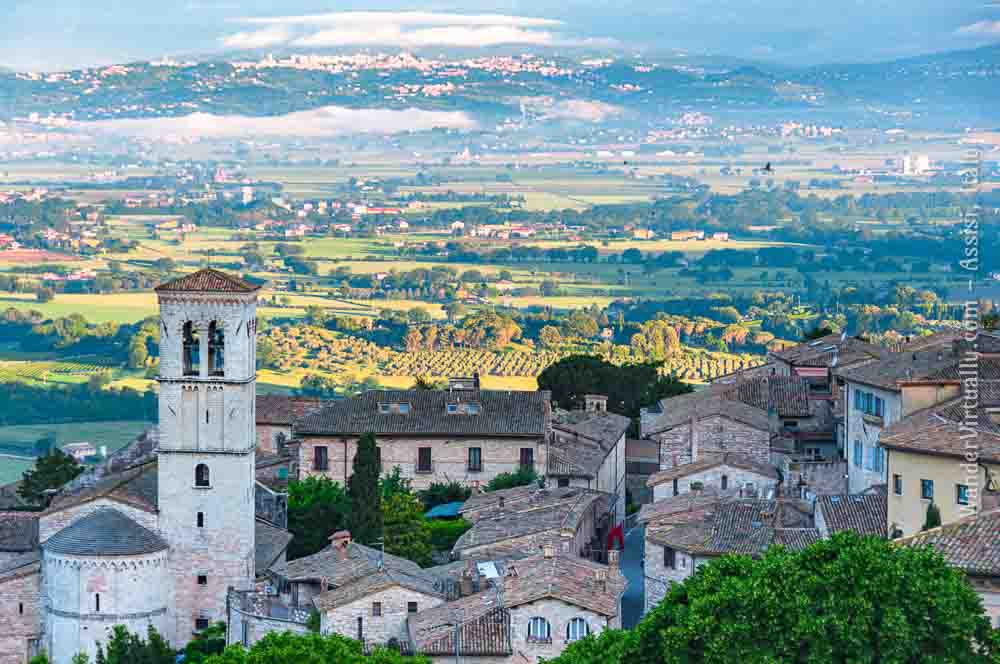 Convents & Monasteries in Assisi: La Chiesa di Santa Maria Maggiore (foreground, left) viewed from the sitting room of St. Anthony's Guest House.