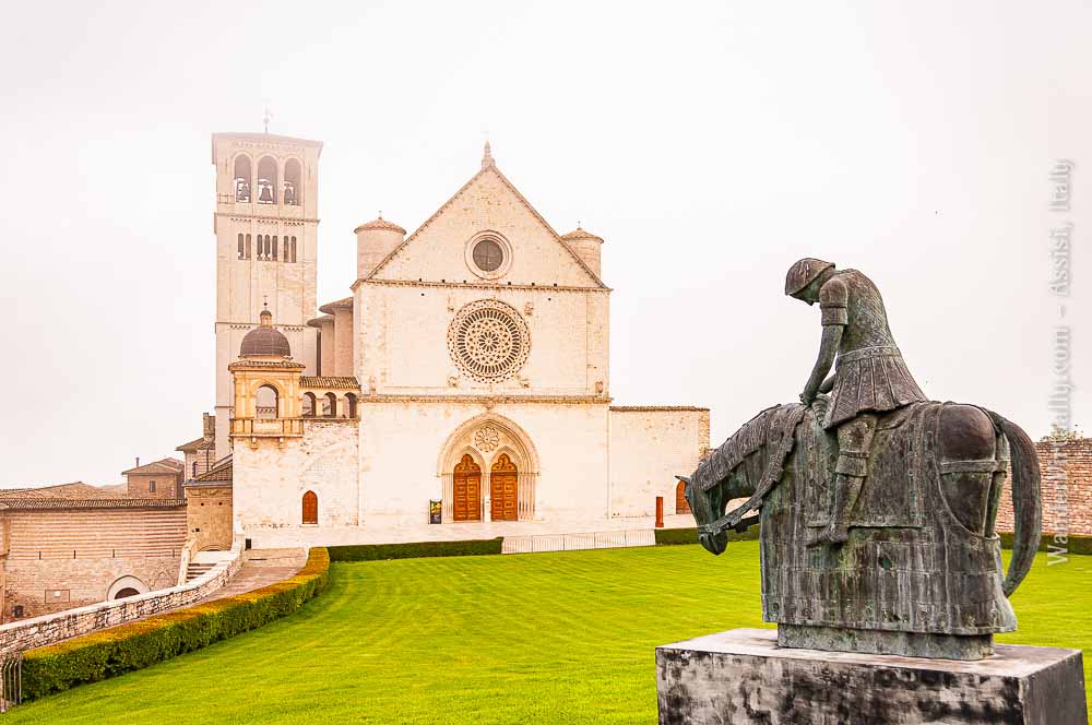 Basilica of St. Francis - enveloped in morning mist. Assisi, Italy.