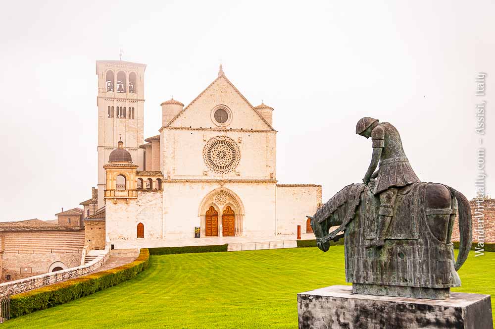 The Basilica of St. Francis - enveloped in the morning mist. Assisi, Italy.