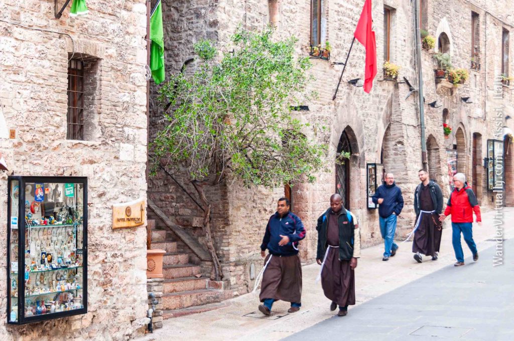 Scenes from Assisi, Italy. Friars on the march to the Basilica of Saint Francis.