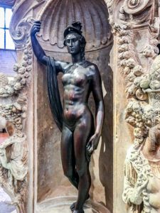 Athena (Minerva) on the base of Cellini's Perseus and Medusa sculpture, @ the Piazza della Signoria, in Florence, Italy.