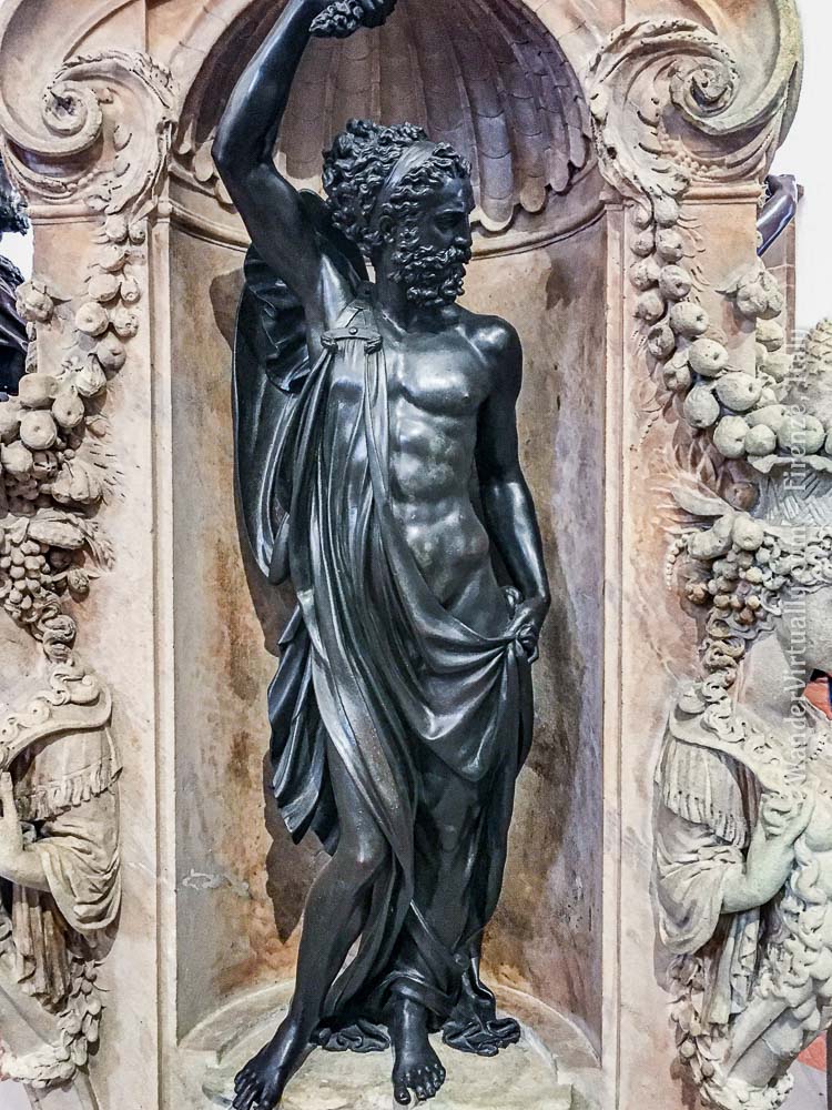 Perseus' and Hercules' shared father - Zeus (Jupiter) on the base of Cellini's Perseus and Medusa sculpture @ the Piazza della Signoria, in Florence, Italy.