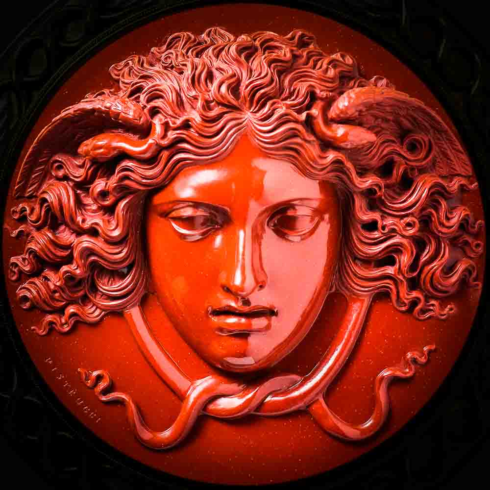 A modern rendering of the Head of Medusa. Cameo by Benedetto Pistrucci 1840-50. @ The Metropolitan Museum, New York City. Ref. (d-1).